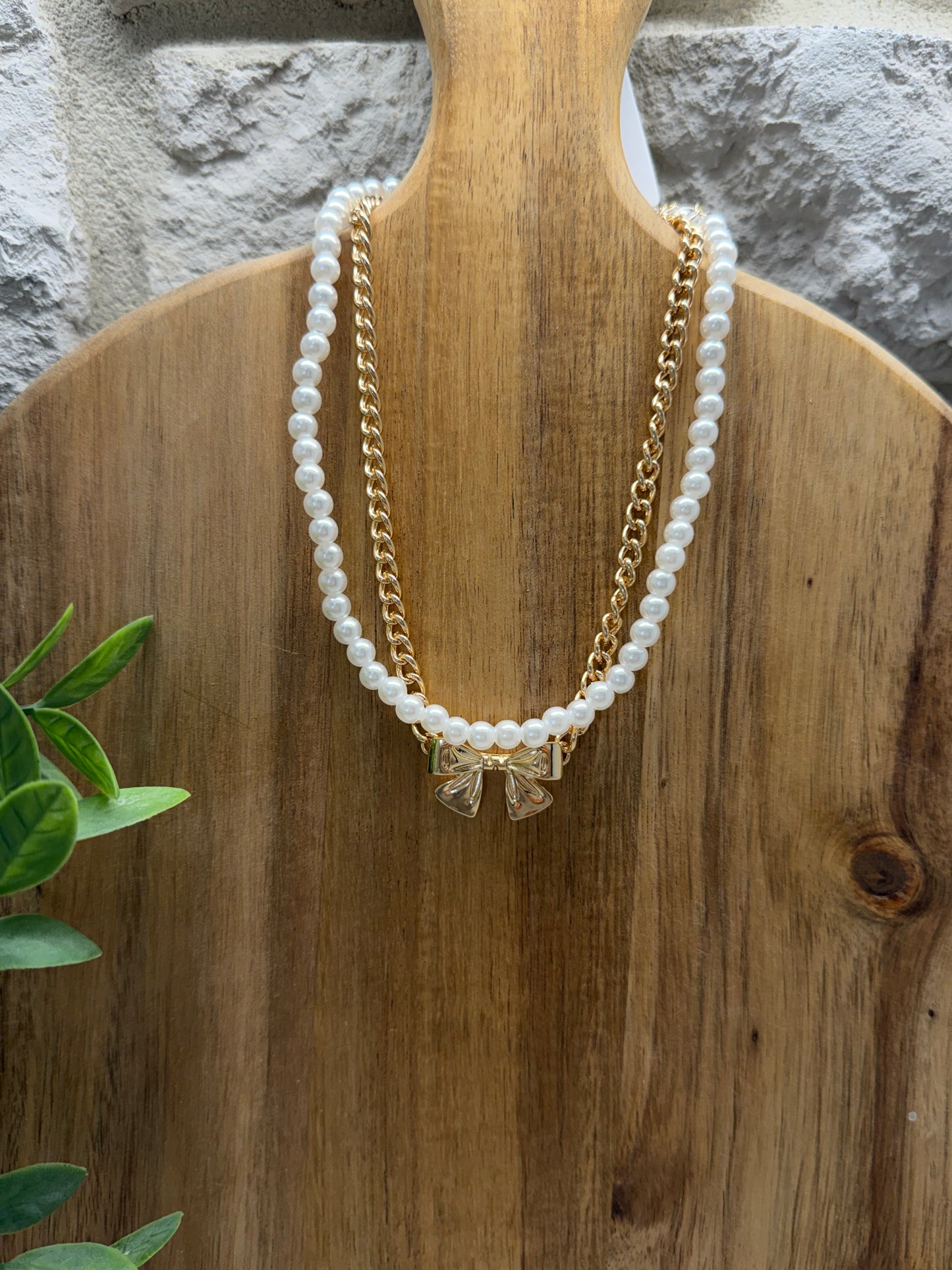 Gold Bow and Pearl Necklace